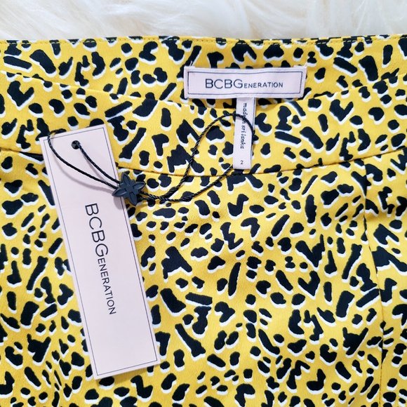 NWT BCBGeneration Printed Front Slit Midi Skirt Yellow/Black Animal Print Size 2 - Picture 8 of 9
